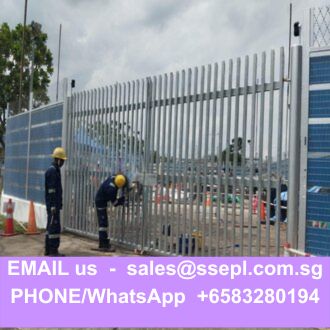 Two construction workers in hard hats install a tall metal fence at a site; bottom purple banner shows sales@ssepl.com.sg and +6583280194.