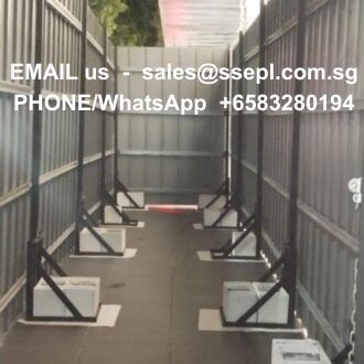 Indoor metal-walled corridor with a contact info overlay: 'EMAIL US — sales@domain.sg' and 'PHONE/WhatsApp +65 83280194'.