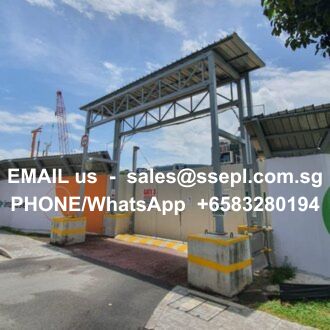 Industrial entry gate at a facility with overlaid contact info: Email sales@ssepl.com.sg, Phone/WhatsApp +65 83280194.